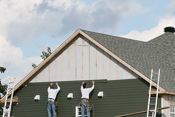 Professional Emergency Siding Repair technician working in Leesburg, OH